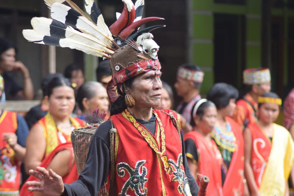 pexels-photo-27009846-27009846 Vibrant celebration of Dayak culture with traditional costumes and rituals in Kalimantan Barat, Indonesia.